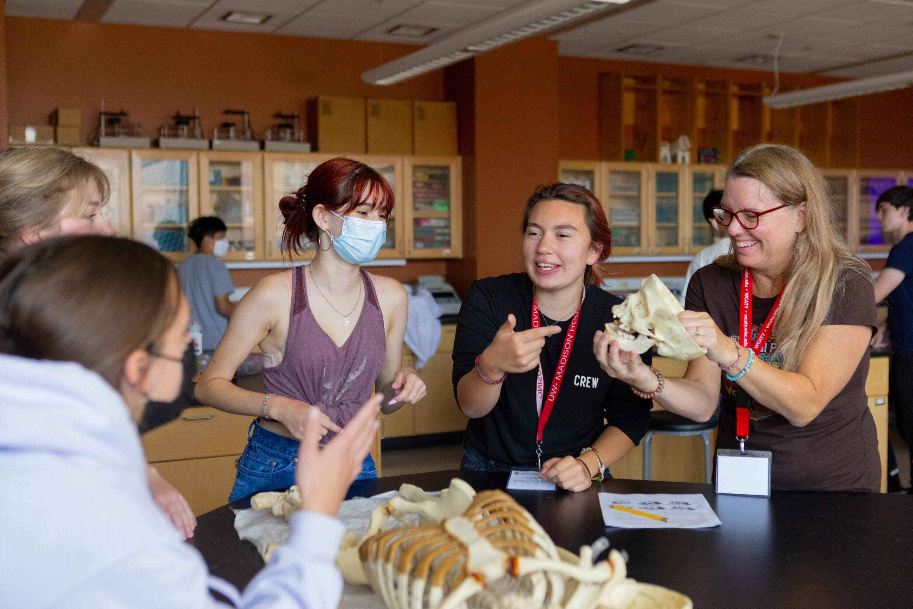 A group of precollege students in a lab