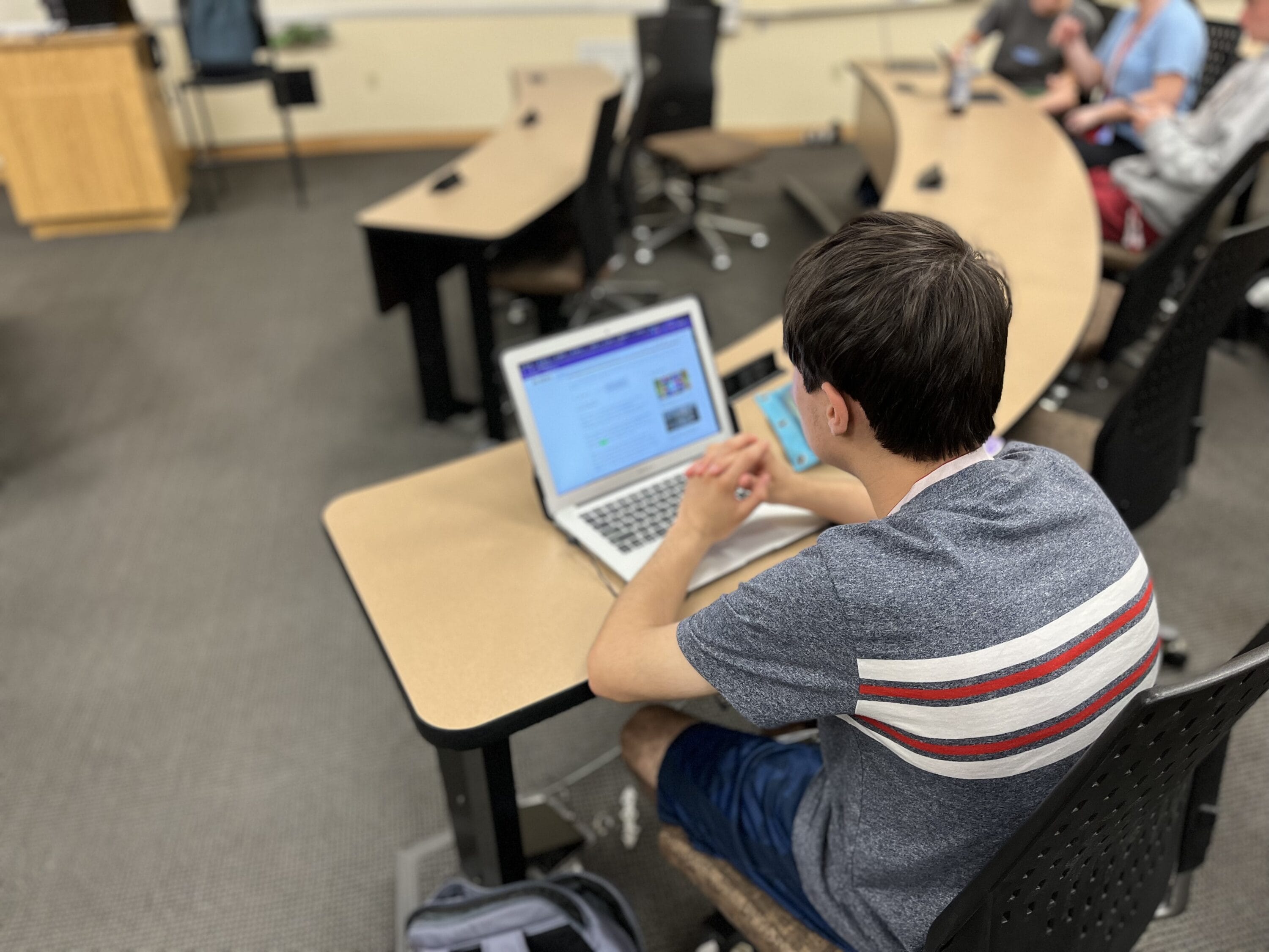 A student in on his laptop