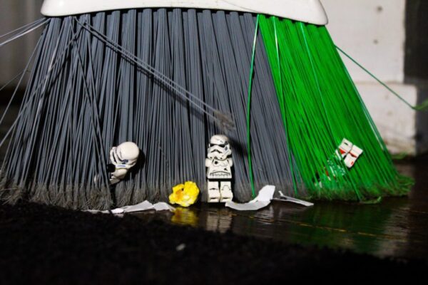 Lego Star Wars characters swept in by a broom